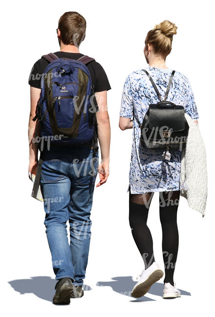 man and woman with backpacks walking in summertime