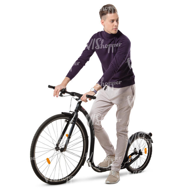 young man riding a kickbike