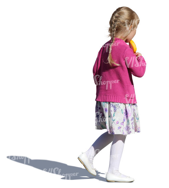 little girl walking and eating an ice cream