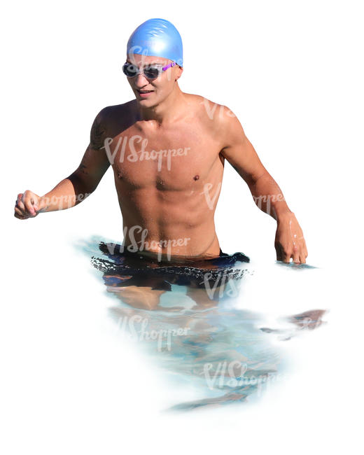 man with a swim cap and goggles standing in water