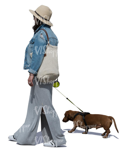 woman with a dachshund walking