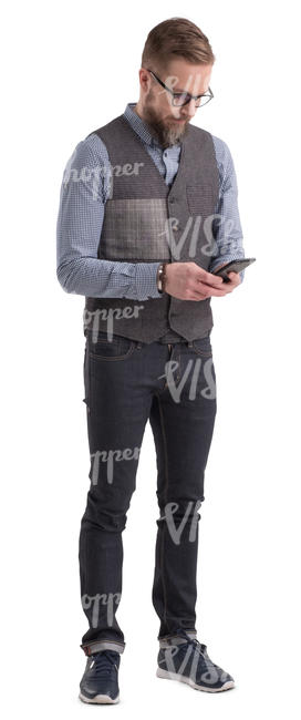 man standing and lookig at his phone