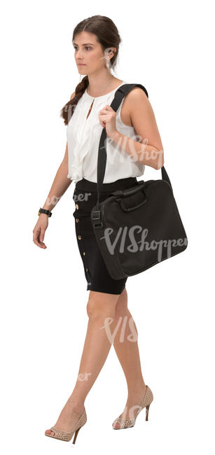 young businesswoman with a laptop bag walking