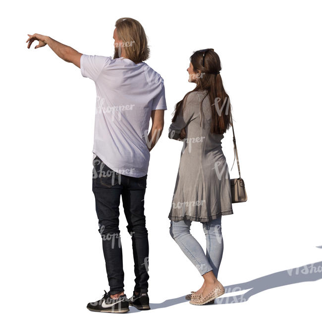 man and woman standing and pointing at smth
