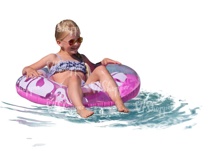 young girl floating with a swimming ring