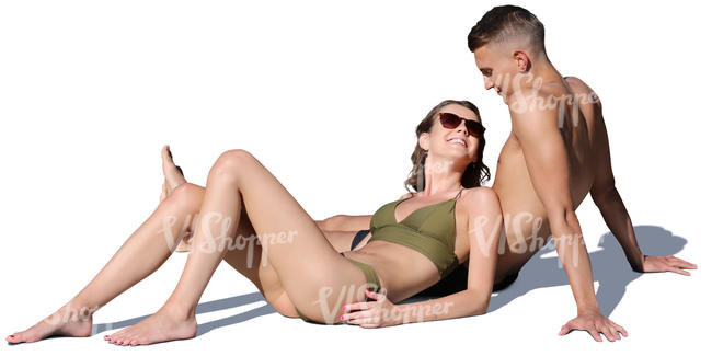 young man and woman relaxing on the beach