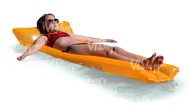 teenage girl floating on a swimming mattress