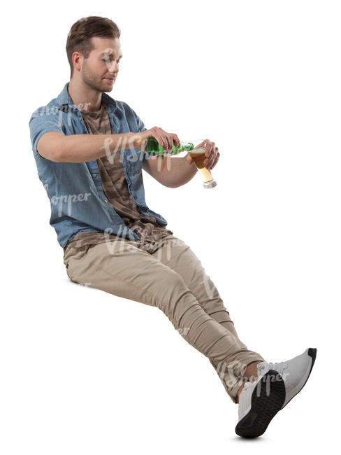 man sitting in a cafe and drinking beer