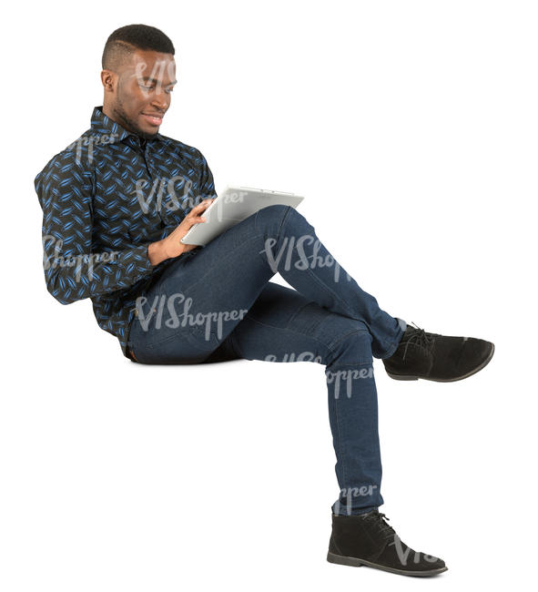 african man sitting and working with tablet