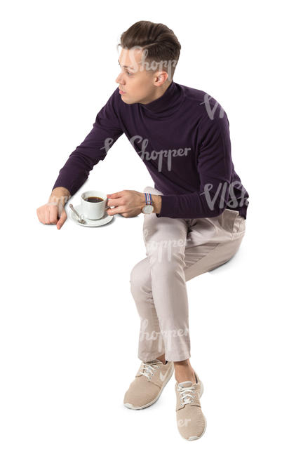 man sitting in a cafe seen from above