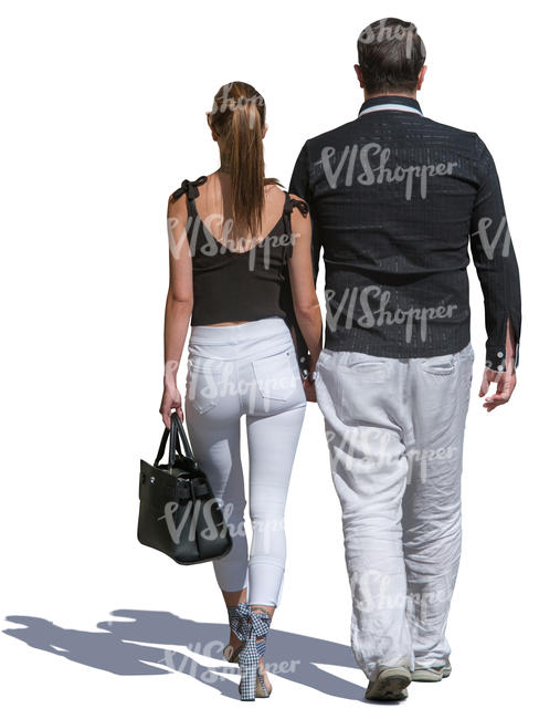 man and woman in black and white walking hand in hand