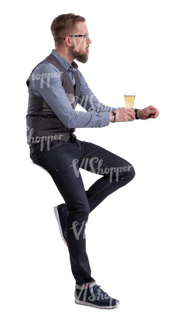 man sitting at a bar counter and drinking beer