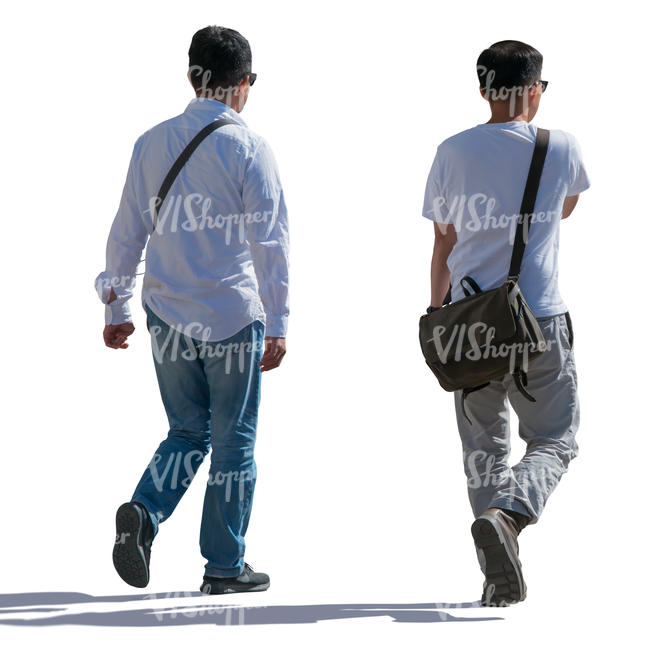 backlit asian men walking