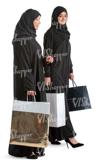 two muslim women with shopping bags walking