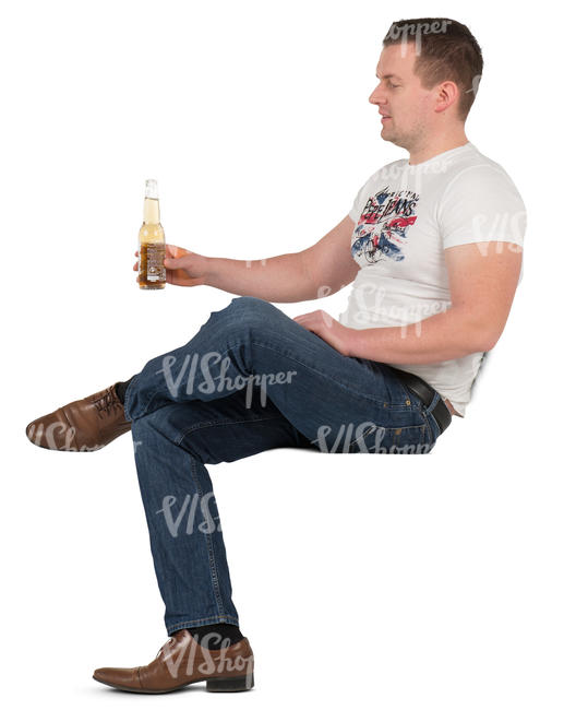 man sitting and drinking beer