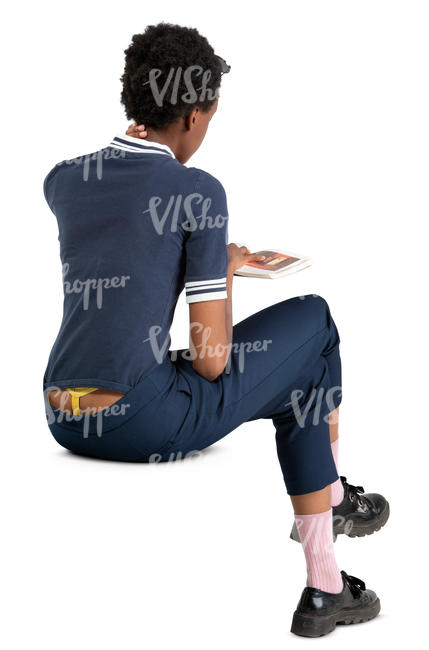 african woman sitting and reading