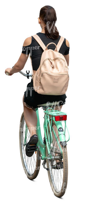 woman with a backpack riding a bicycle