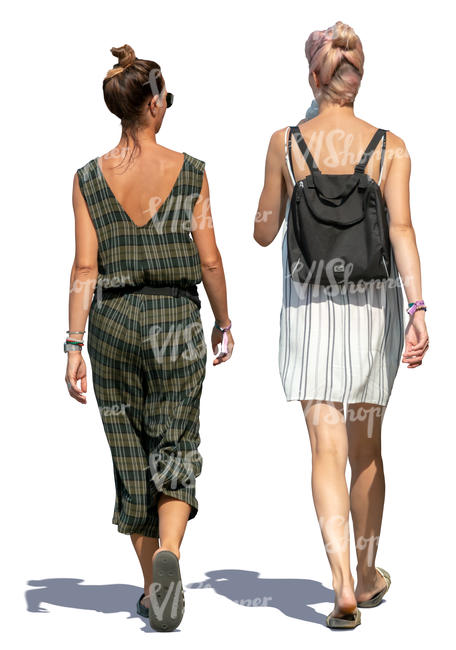 two women in summer outfits walking 