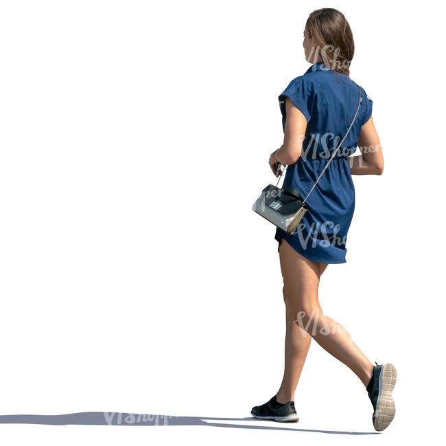 woman in a blue summer dress walking