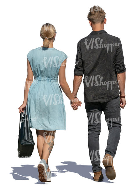 man and woman walking hand in hand