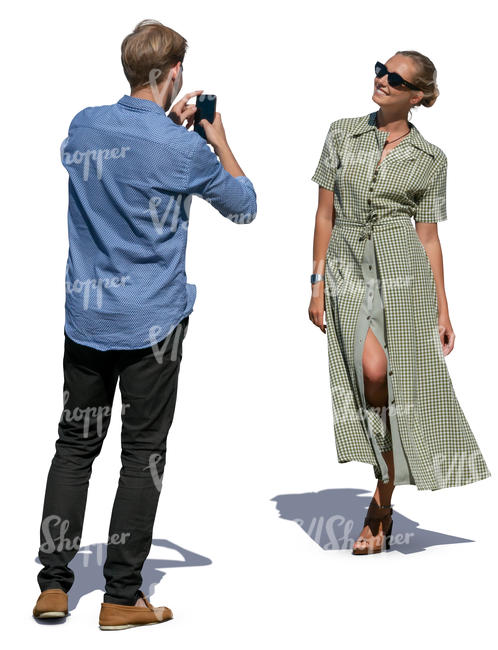 man taking a picture of a woman