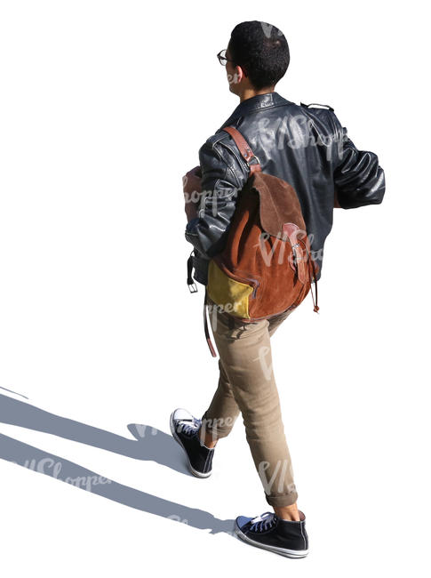 man with a suede backpack walking seen from above