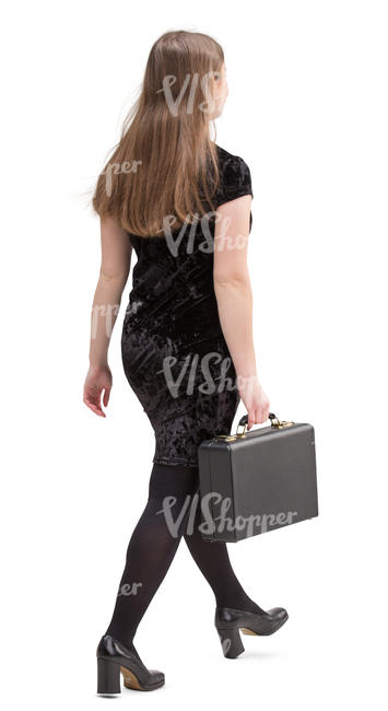 woman in a black dress walking