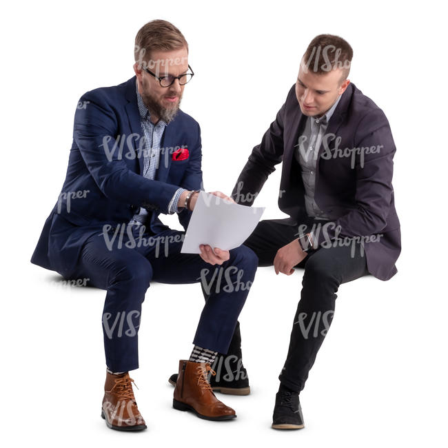 two businessmen sitting and talking