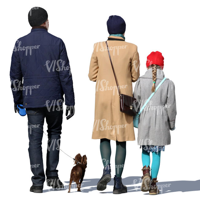family of three walking with their dog