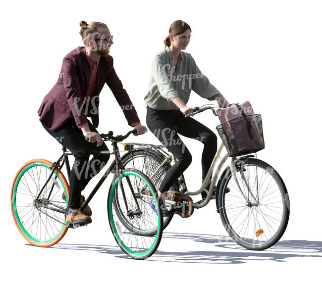 backlit man and woman riding a bike side by side