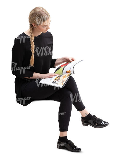 woman sitting and reading a magazine