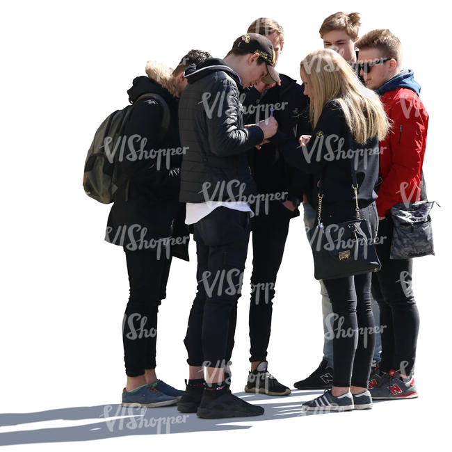 group of six young people standing and looking at smth