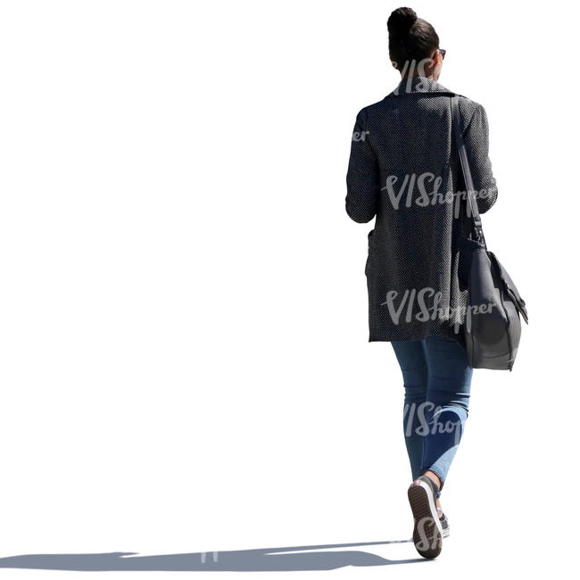 backlit woman walking