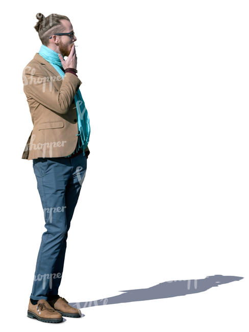 young hipster man standing and smoking