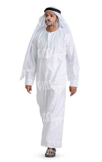 arab man in a white thobe walking