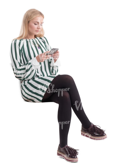 woman sitting and checking her phone