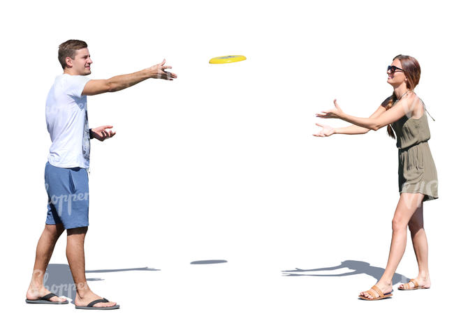 man and woman playing frisbee