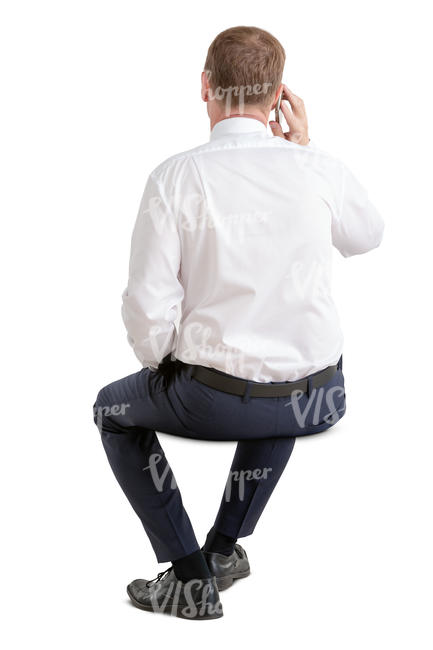 businessman sitting and talking on the phone