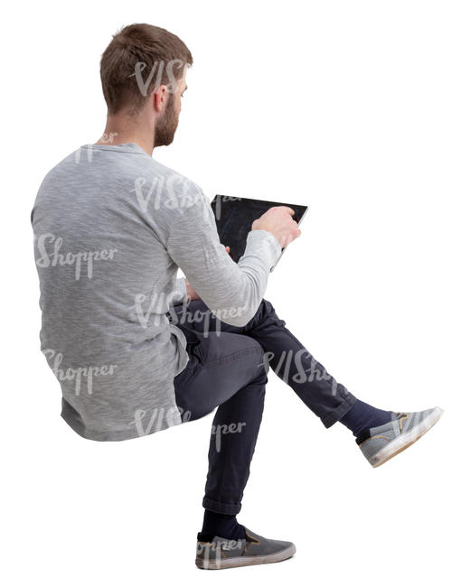 man with a tablet sitting