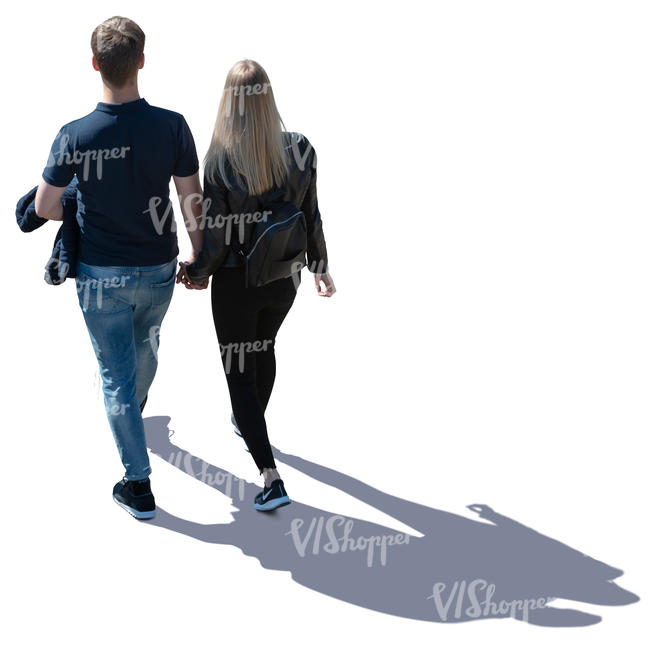 backlit couple walking seen from above