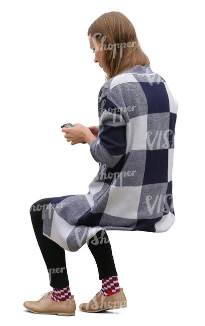 woman sitting and checking her phone