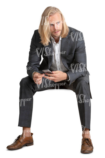 man in a suit sitting