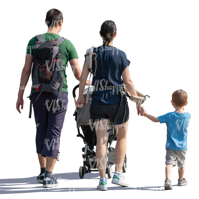 backlit family of three walking