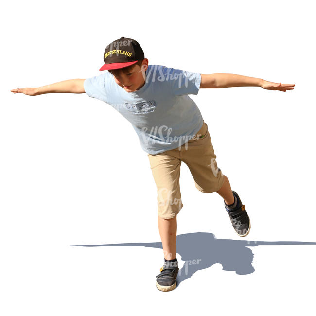 boy with a baseball cap playing