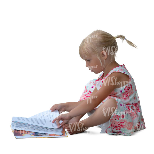 little girl sitting and reading a book