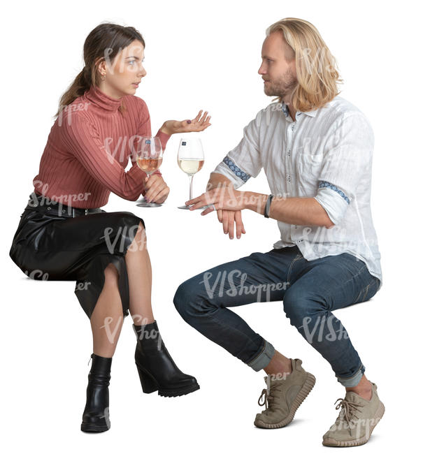 man and woman sitting in a restaurant