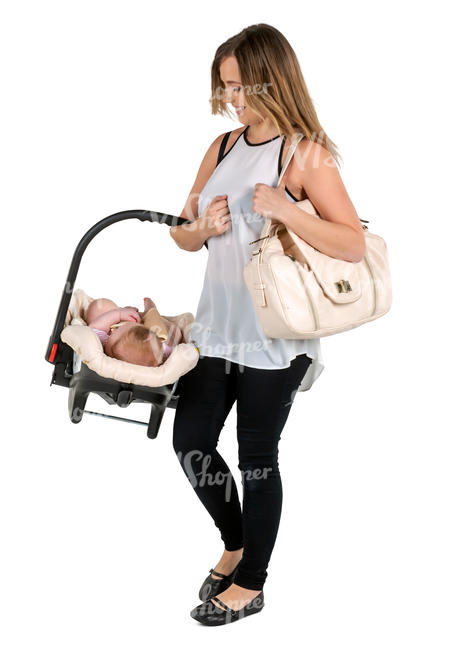mother carrying her baby in a baby car seat