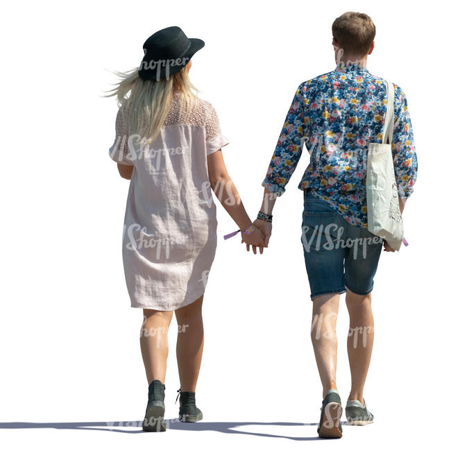 trendy couple walking hand in hand