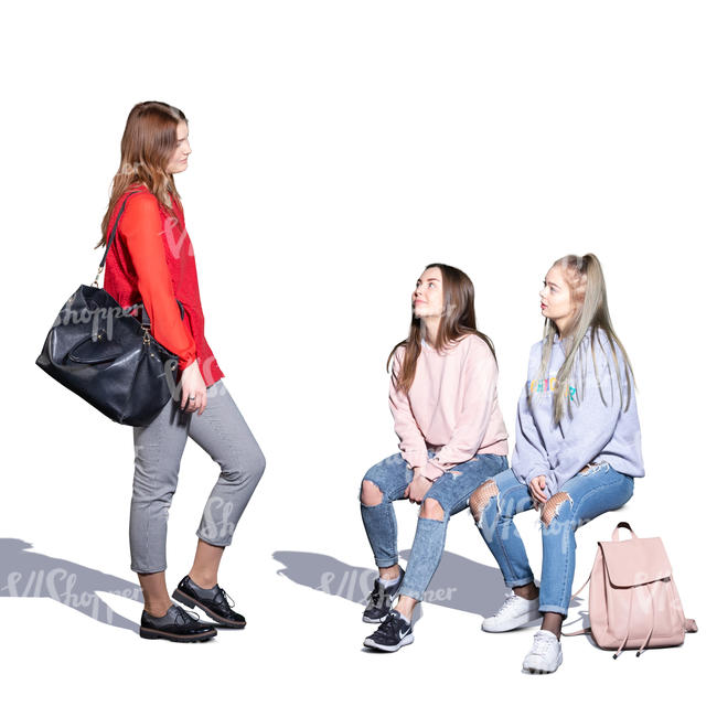 three teenage girls talking