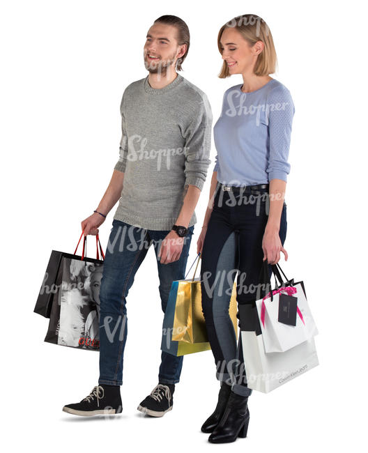 smiling man and woman with shopping bags walking